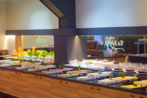 a buffet line with plates of food on display at Aksular Hotel in Trabzon