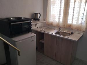 Kuchyň nebo kuchyňský kout v ubytování Marios House 2