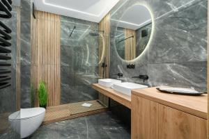 Bilik mandi di Arena Lux Apartment Kasprowicz Park by Renters Prestige