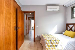 Postel nebo postele na pokoji v ubytování Par 4 Villa 9
