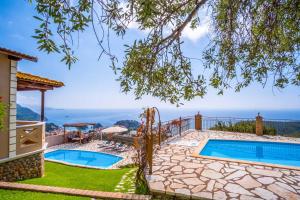 Πισίνα στο ή κοντά στο Apolis Executive Villa