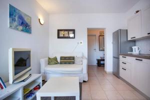 Kuchyňa alebo kuchynka v ubytovaní Apartments Villa Leylandia