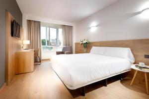 Posteľ alebo postele v izbe v ubytovaní Apartaments SB Corona Tortosa