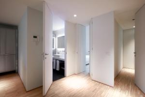 A bed or beds in a room at BasicVillage Milano