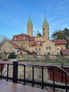 a view of a building with two towers at Ferienhaus am Steinmeister Turm in Naumburg