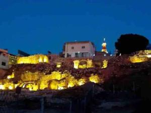 a view of the acropolis lit up at night at Madaba Hills Apt in Madaba