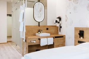 Postelja oz. postelje v sobi nastanitve BEE GREEN Linz Self-Check-in-Hotel