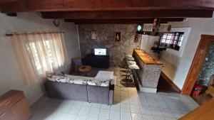an aerial view of a living room with a fireplace at Holiday Home Nikolić in Njeguši