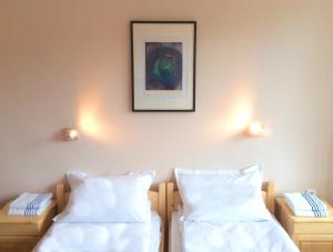 Una cama o camas en una habitación de Hotel Hinovi Hvoyna