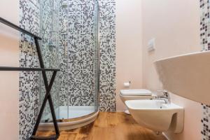 Koupelna v ubytování Casa Lidia Luxury attico 7