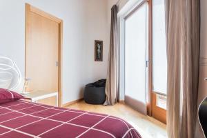 Postel nebo postele na pokoji v ubytování Casa Lidia Luxury attico 7