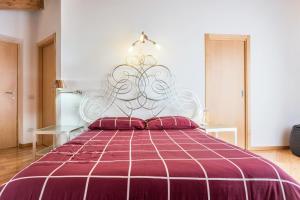 Postel nebo postele na pokoji v ubytování Casa Lidia Luxury attico 7
