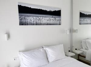 A bed or beds in a room at Aelia Apartment 2 Ioannina