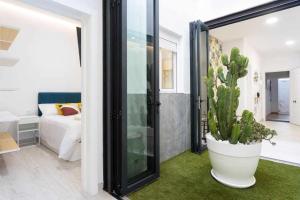 A bed or beds in a room at Sunnyland terraza san andrés