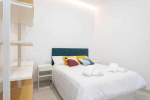 A bed or beds in a room at Sunnyland terraza san andrés