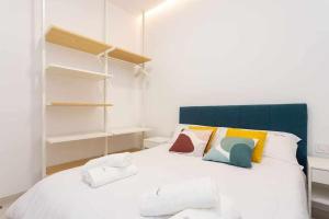 A bed or beds in a room at Sunnyland terraza san andrés