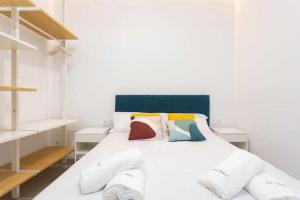 A bed or beds in a room at Sunnyland terraza san andrés