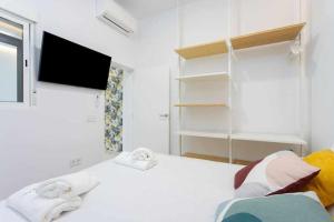 A bed or beds in a room at Sunnyland terraza san andrés