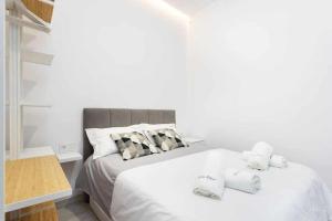 A bed or beds in a room at Sunnyland terraza san andrés