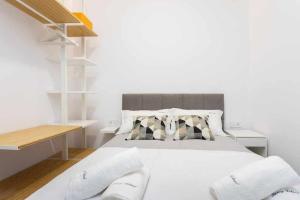 A bed or beds in a room at Sunnyland terraza san andrés