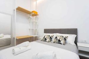 A bed or beds in a room at Sunnyland terraza san andrés