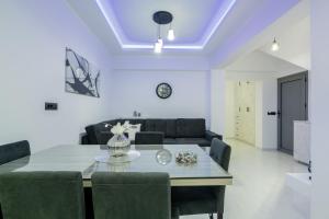 Χώρος καθιστικού στο Jensila Suite by "elite"