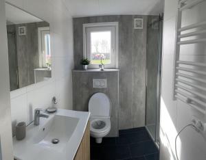 Koupelna v ubytování Chalet 't Kwedammertje + 5 fotografií
