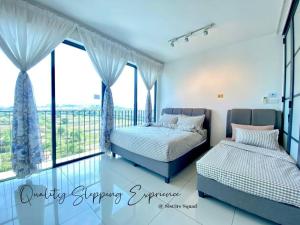 a bedroom with two beds and a balcony with windows at RelaxFamily 2-10Pax Trefoil Setia City Shah Alam SiS Homestay in Shah Alam