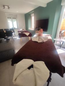 Postel nebo postele na pokoji v ubytování Gîte Chez Tim
