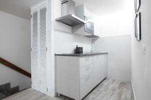 Η κουζίνα ή μικρή κουζίνα στο My Piazza Navona Jacuzzi Suite - Top Collection