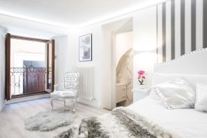 Ένα ή περισσότερα κρεβάτια σε δωμάτιο στο My Piazza Navona Jacuzzi Suite - Top Collection