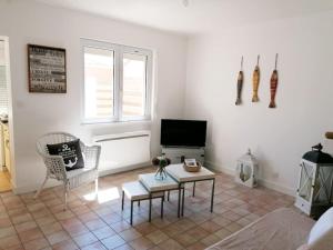 TV a/nebo společenská místnost v ubytování Maison de vacances 4/6 personnes