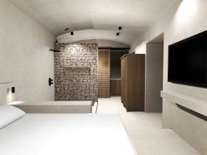 A bed or beds in a room at EliteDIMension Chalki