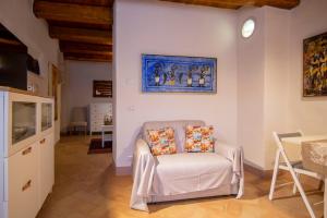 Ένα ή περισσότερα κρεβάτια σε δωμάτιο στο Il Borgo Divino - Torre del Colle, Bevagna +25 φωτογραφίες