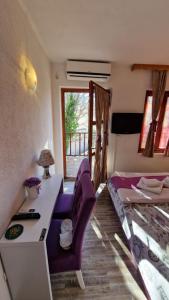Postel nebo postele na pokoji v ubytování Pansion Oscar Summer Garden