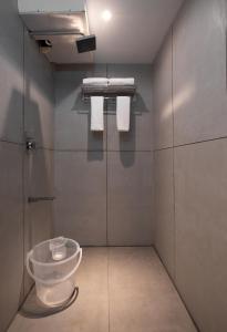 Koupelna v ubytování Grande Inn Trichy + 35 fotografií