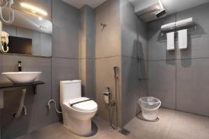 Koupelna v ubytování Grande Inn Trichy