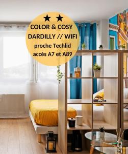 a bedroom with a bed and a book shelf at COLOR & COSY DARDILLY in Dardilly
