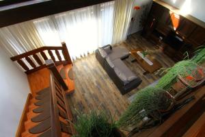 an aerial view of a living room with a couch at Villa Grossglockner Heiligenblut in Heiligenblut