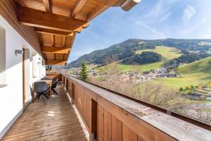 a balcony with a view of the mountains at Landhaus Kendler in Saalbach Hinterglemm