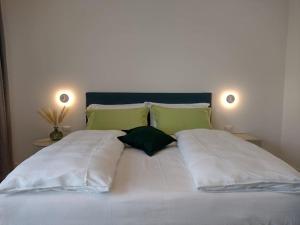 Ένα ή περισσότερα κρεβάτια σε δωμάτιο στο LA CORTESE by La Rondinella Apartments +27 φωτογραφίες