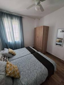 Posteľ alebo postele v izbe v ubytovaní Vivienda Rural Sentirte 2 Centro de Aracena + 37 fotografií