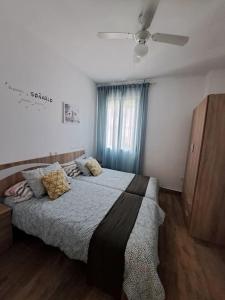 Posteľ alebo postele v izbe v ubytovaní Vivienda Rural Sentirte 2 Centro de Aracena