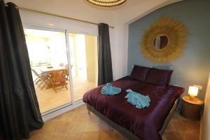 Posedenie v ubytovaní Magnifique Rez de jardin à 150 M de la mer