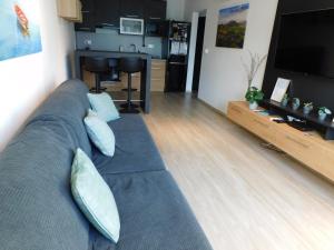 Televízia a/alebo spoločenská miestnosť v ubytovaní Chill & Relax Apartment