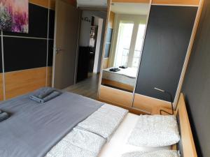 Posteľ alebo postele v izbe v ubytovaní Chill & Relax Apartment