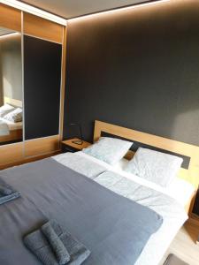 Posteľ alebo postele v izbe v ubytovaní Chill & Relax Apartment