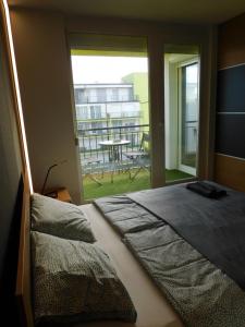 Posteľ alebo postele v izbe v ubytovaní Chill & Relax Apartment