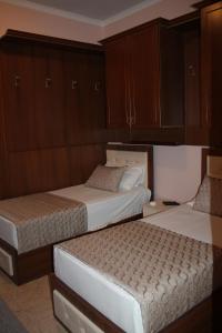 מיטה או מיטות בחדר ב-Hotel Hasmegaj