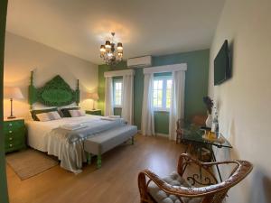 Uma cama ou camas num quarto em Villa Silene